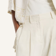 TAILORED PLEATED PANTS